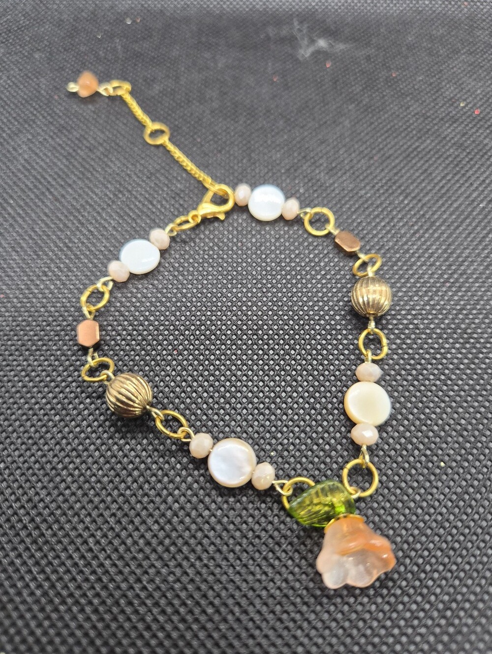 Delicate Gold-Tone Bracelet with Pink Shell Beads and Orange Flower Charm